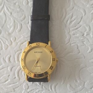 Gold Roman Numeral Quartz Watch with Black Leather Strap